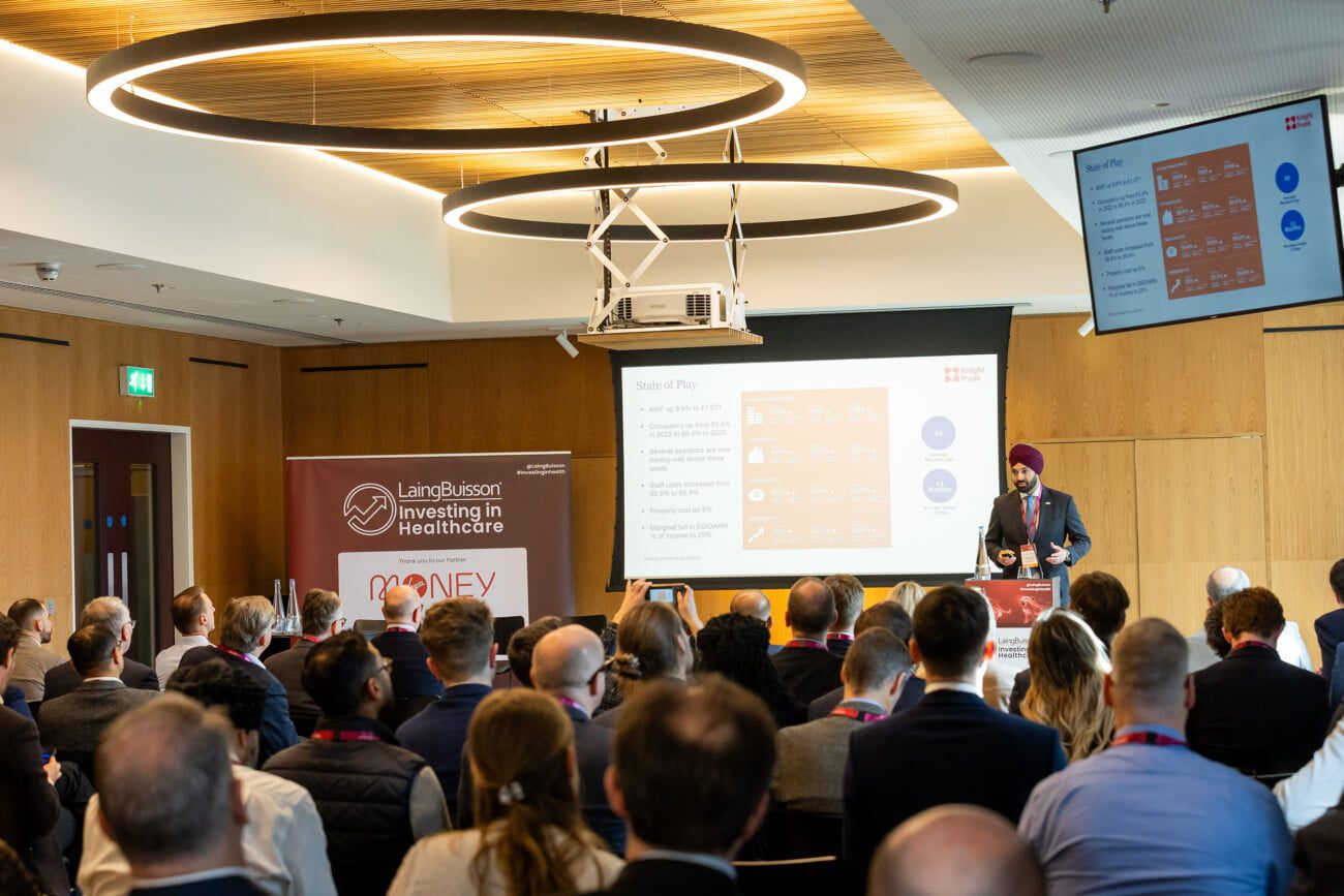 Event Photographer at The View Royal College of Surgeons in London - Conference Photographer Carmen Valino Captures one of the Keynote Speakers as the audience listens