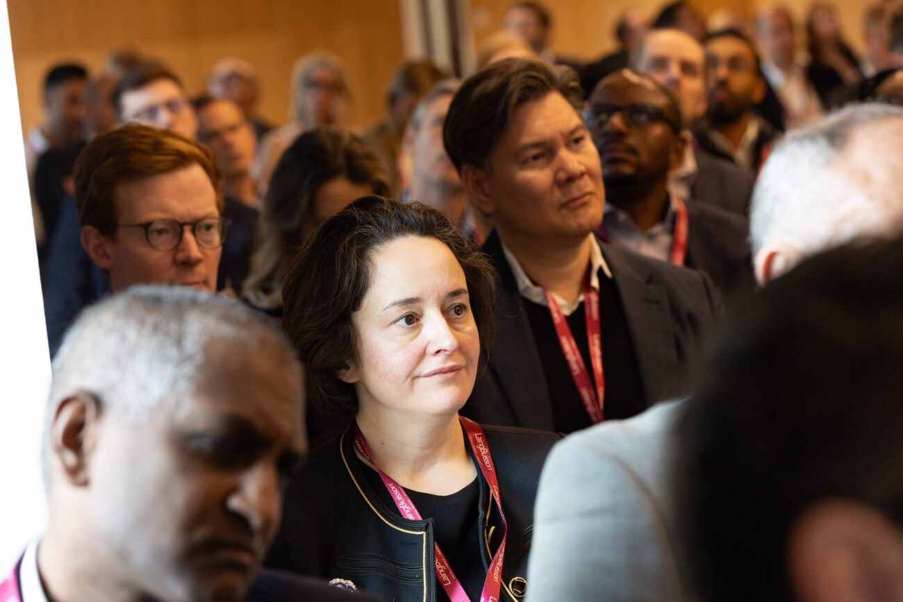 Event Photographer at The View Royal College of Surgeons in London - A delegate in the audience during a conference in this photograph by Carmen Valino corporate photographer