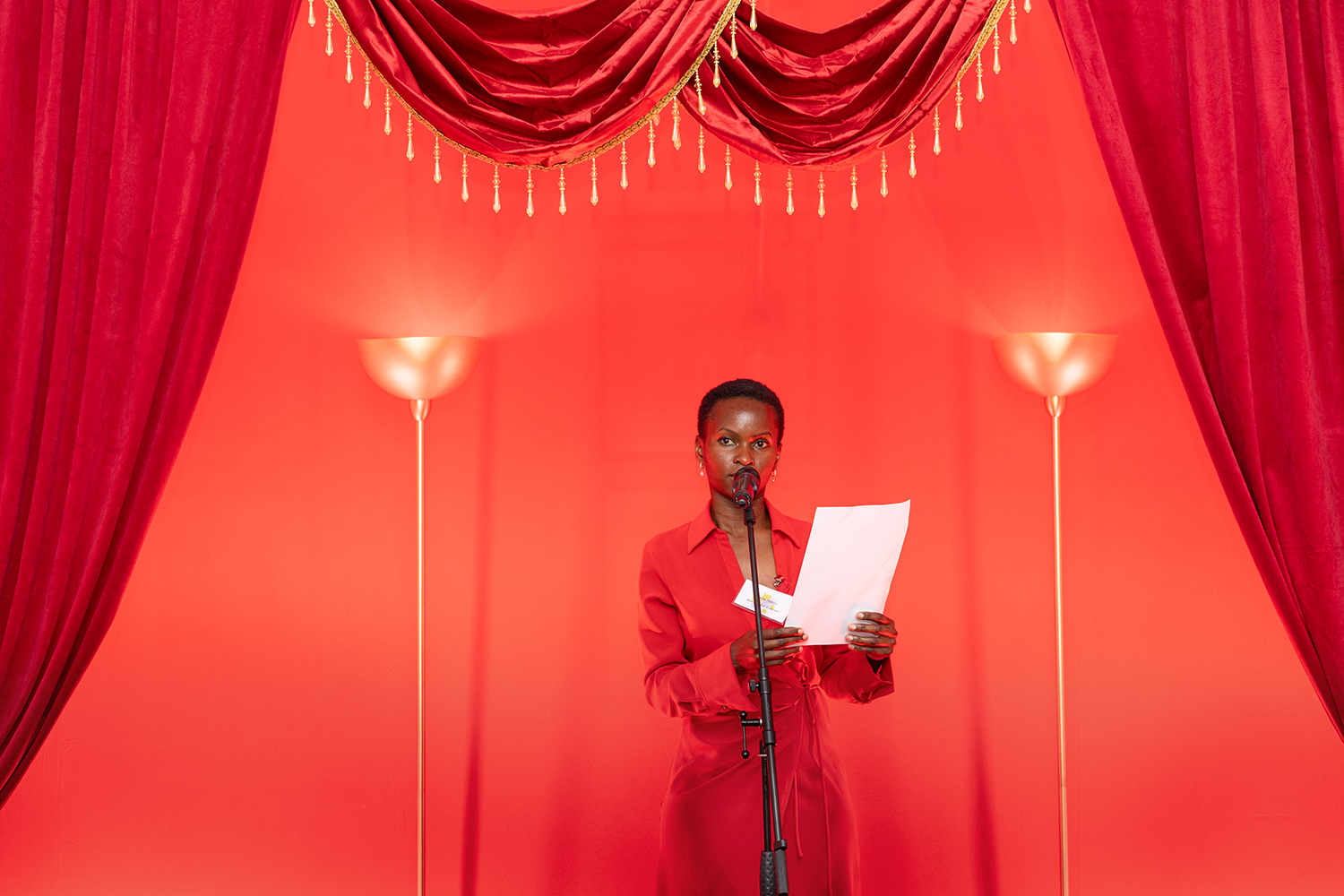London event photography black female speaker London event photographer Marion Atieno Osiejo speaking at The Rift, the new research cycle from Chatham House Sustainability Accelerator